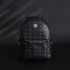 MCM Stark Visetos Medium Backpack – Black Monogram with Studded Detailing